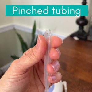 Breast pump tubing that is pinched