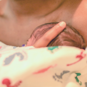 Newborn skin to skin with parent after birth