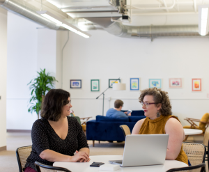 Women talking in an office