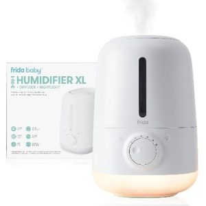 Frida Baby 3-in-1 humidifier with nightlight and diffuser in baby’s 